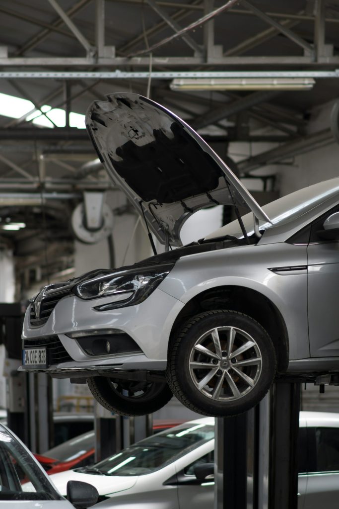 A car being worked on in a car repair shop